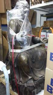 400 lb. Bronze Buddha gets ready for trip to China